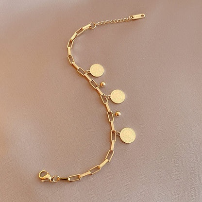Bracelet à breloques pièces pour femmes
