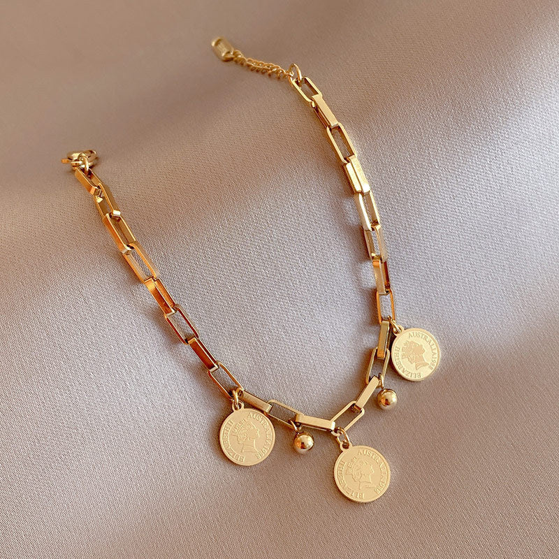 Bracelet à breloques pièces pour femmes