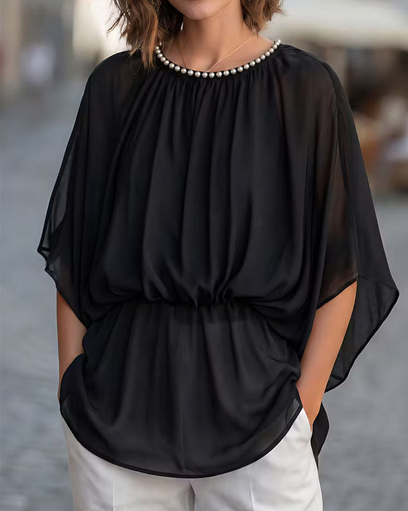 Blouse à manches chauve-souris pour femmes