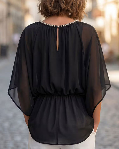 Blouse à manches chauve-souris pour femmes