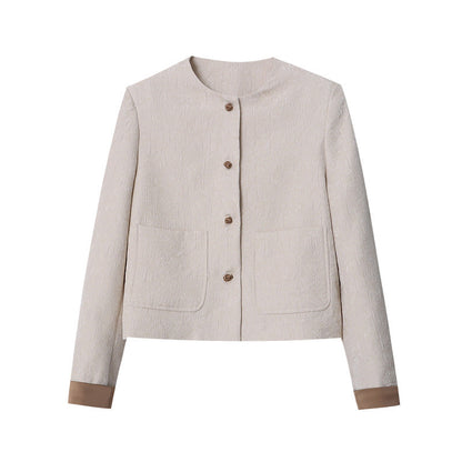 Veste courte à col rond et fermeture boutonnée pour femme